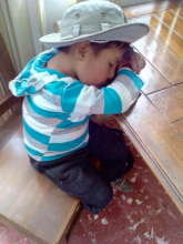 Sleeping Bolivian boy awaits dental care