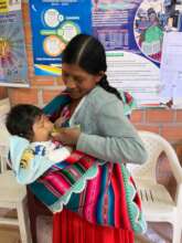 Mother and her baby at Medical Post by school