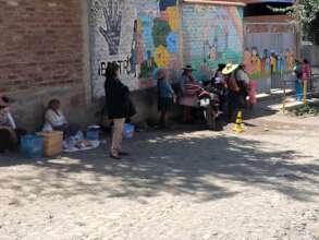 Mothers and vendors at Marquina school