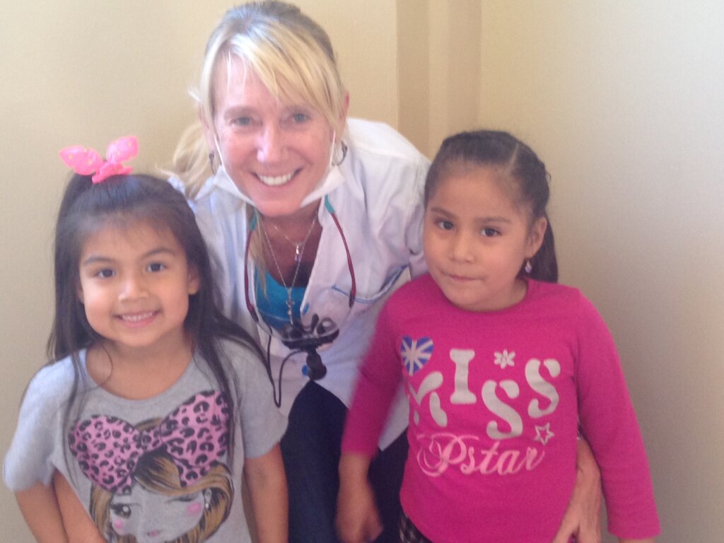 Founder Sandy Kemper with Bolivian girls