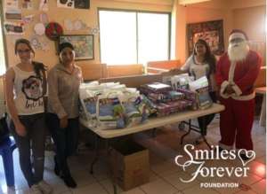 Smiles Forever Santa brings care packages