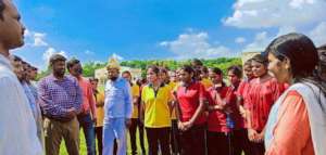 IMB participant girls with the government official