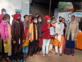 Young women organized to operate a public toilet