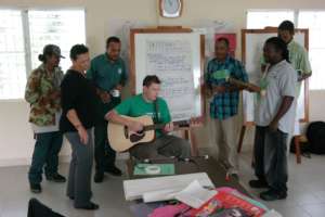 The staff of TIDE learns messaging through music.