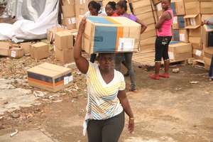 GPFA Scholars Assist with MedShare Distribution