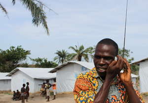 Man listens to radio in Liberia