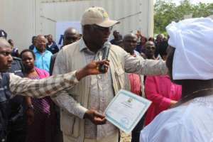 Adama with the President of Sierra Leone