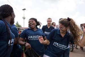 The team celebrates the end of the outbreak