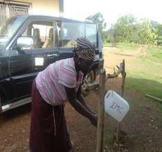 Tippy tap in use at Yataya PHU in Koinadugu