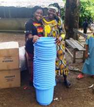 Handing of gifts to Orphanage Founder