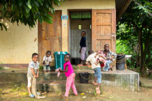 Children cleaning their bathroom. Everyone works!