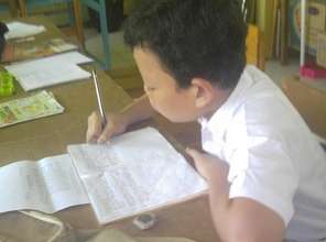 Yeremia is writing the homework