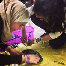 Girls in Lebanon making gift for girls in Canada