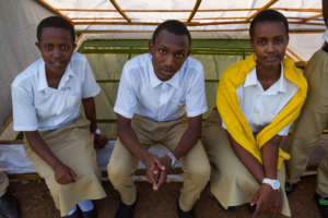 St. Andre students sitting near Spirulina farm