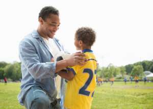 A single father enjoys time with his son.