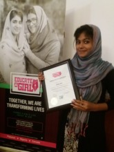 EAG scholar Aisha with her certicate