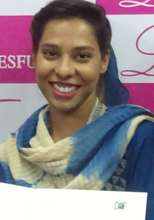 Humaira Anwar getting a certificate