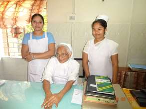 Bhavani, a nurse at work place with her team