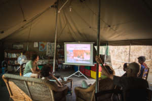 Earthwatch volunteers attend a lecture on Majete