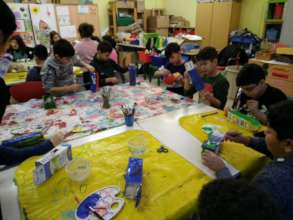 Handcrafting lanterns out of old milk-packages