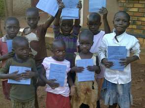 Jinja children receive school books