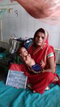 Child at the Nutrition Centre with Mother