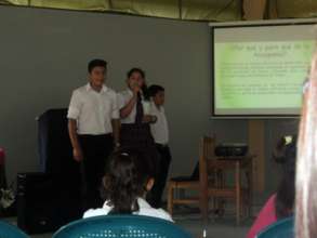 Melvin, Jeovana and Juan giving the presentation
