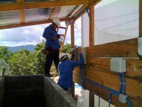 Engineers installing the electrical system