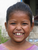 A girl in rural Nepal who is supported by NYOF