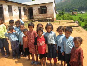 Students in a rural village lining up for school