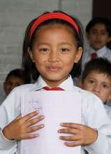 Young Student Learning to Write