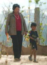 Lalthanzami with a child living in the Safe Home