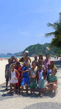 Watching hang gliders at Sao Conrado beach