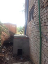 Incinerator at the back of the toilet