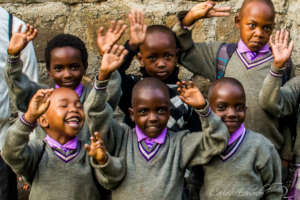 Off to school in our new uniforms made by our mums