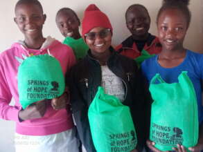 Our Saturday girls club take home a food hamper