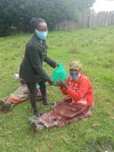 Elderly lady displaced to IDP camp due to floods.