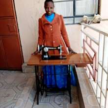 Susan proudly showing her new sewing machine.