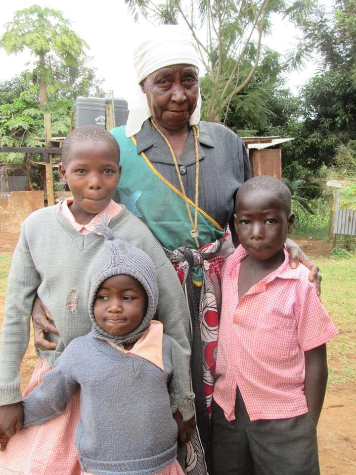 Martha with 3 of her 6 Great Grandchildren