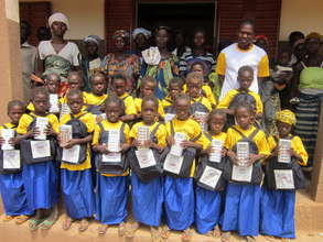 Tenkoaglega girls with school supplies