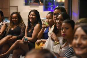 our graduates listen and exchange memories
