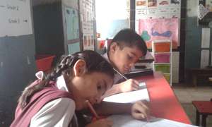 Priya and Amar writing