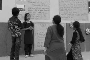 Sabeena explaining the details of her community