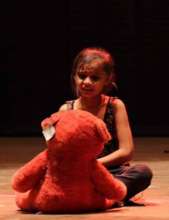 #2 Parvaarish Play: Student performing on stage