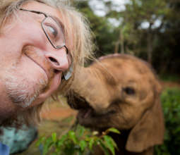 WildAid video producer Andy with a baby elephant!