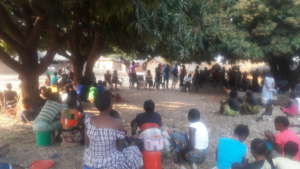 Members of the community gather for health talk