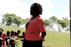 Headteacher at Kirobon addressing the students
