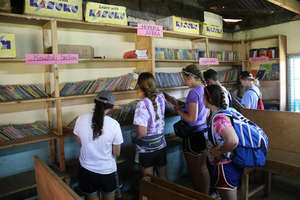 Adding new books to Ogilgei Primary's library.