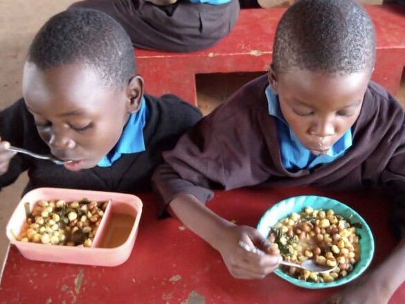 Pupils enjoy their lunch with added greens