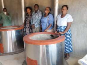 Management at Mkamenyi inspect the new kitchen
